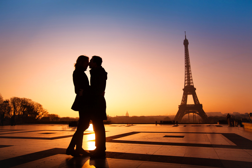 loving couple kissing on Eiffel Tower background, Paris, France